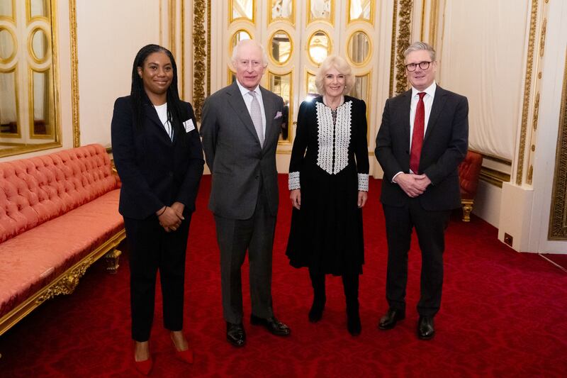 The King and Queen with Conservative Party leader Kemi Badenoch and Prime Minister Sir Keir Starmer during a reception at Buckingham Palace