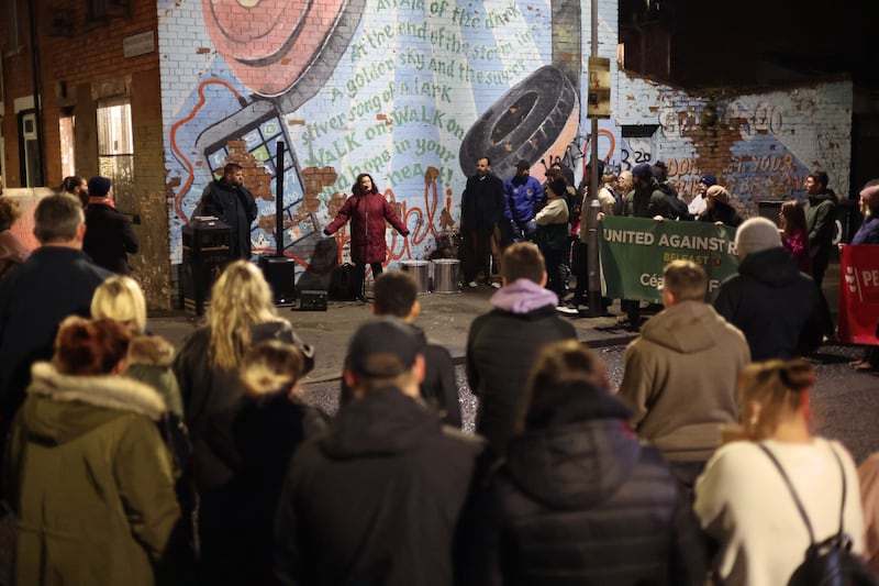 Residents gather for a rally in Beechmount to support a local family following a racist attack on their home. PICTURE: MAL MCCANN