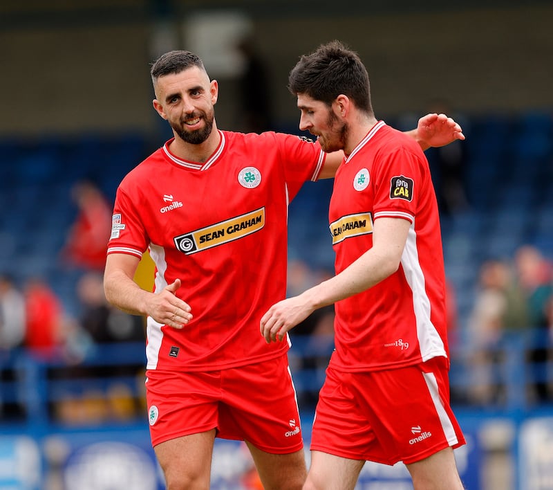 Pacemaker Press.

17-8-24.

Glenavon Fc v Cliftonville Fc,
Cliftonville's Joe Gormley and Cliftonville's Kris Lowe during this evenings game at Mourneview Park in Lurgan.  

Photo by Alan Weir/Pacemaker