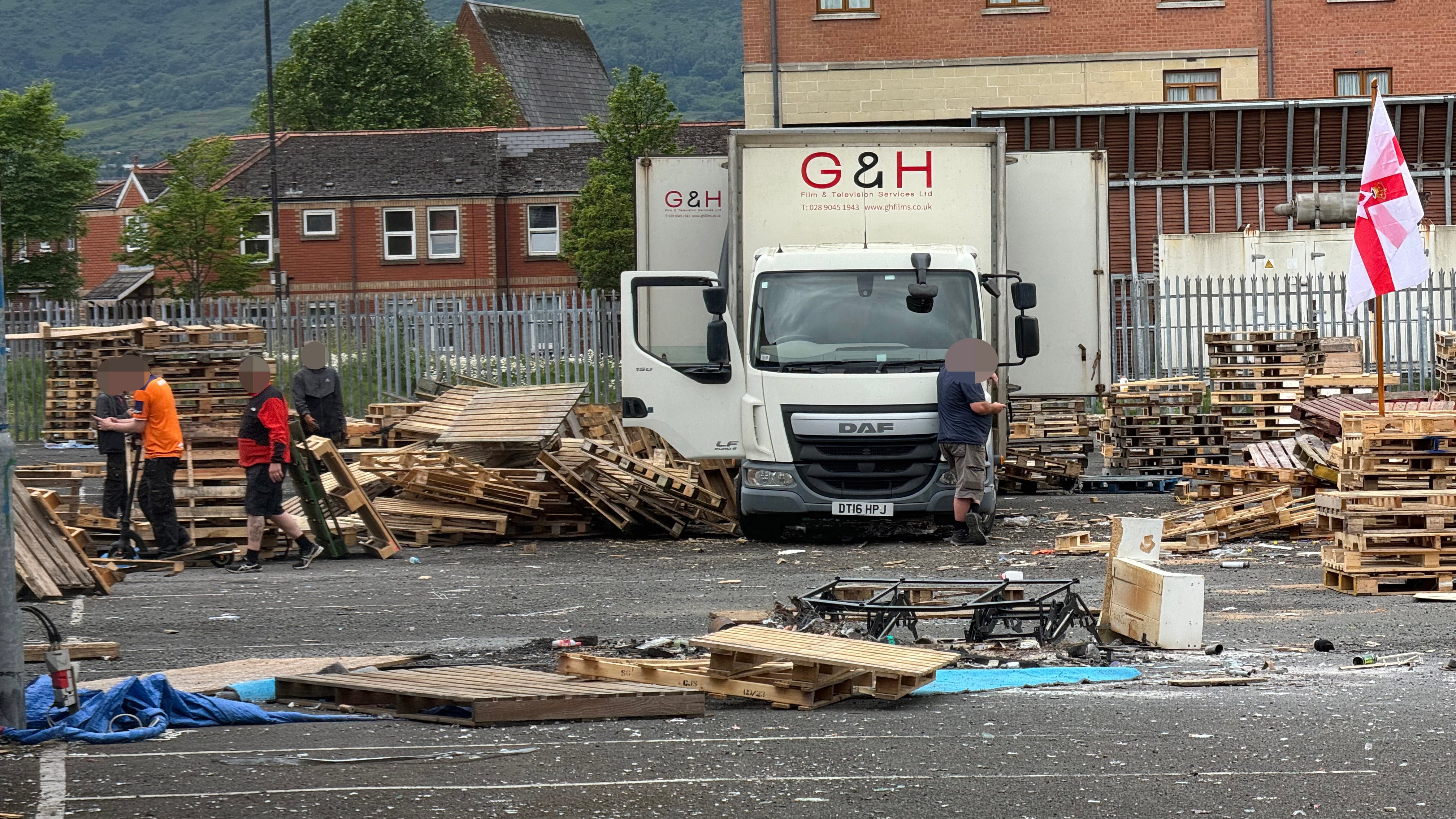 Wooden pallets being delivered to a bonfire site near Sandy Row in south Belfast NO BYLINE