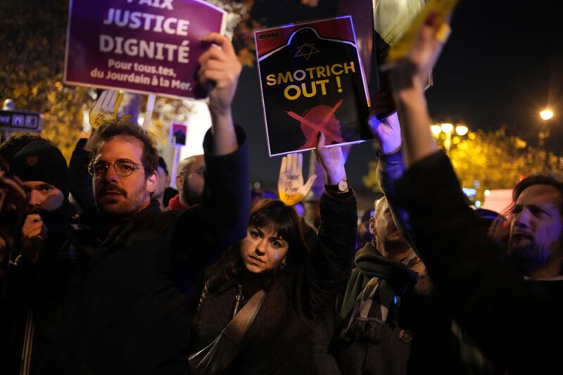 Protesters rally against the gala (Ahristophe Ena/AP)