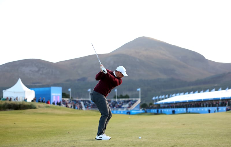 Rory McIlroy plays his second shot on the 18th at the Amgen Irish Open on Thursday. Picture by Jan Kruger/Getty Images