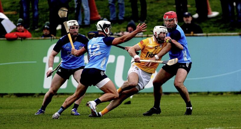 Antrim&#39;s Neil McManus battles with Dublin&#39;s Chris O&#39;Leary, Cian Boland, and Paddy Smyth. Picture Seamus Loughran 