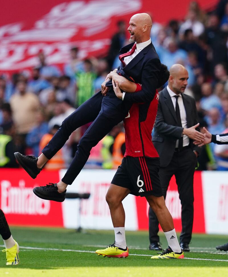 Erik ten Hag was lifted off the ground by Lisandro Martinez in the celebrations at the final whistle