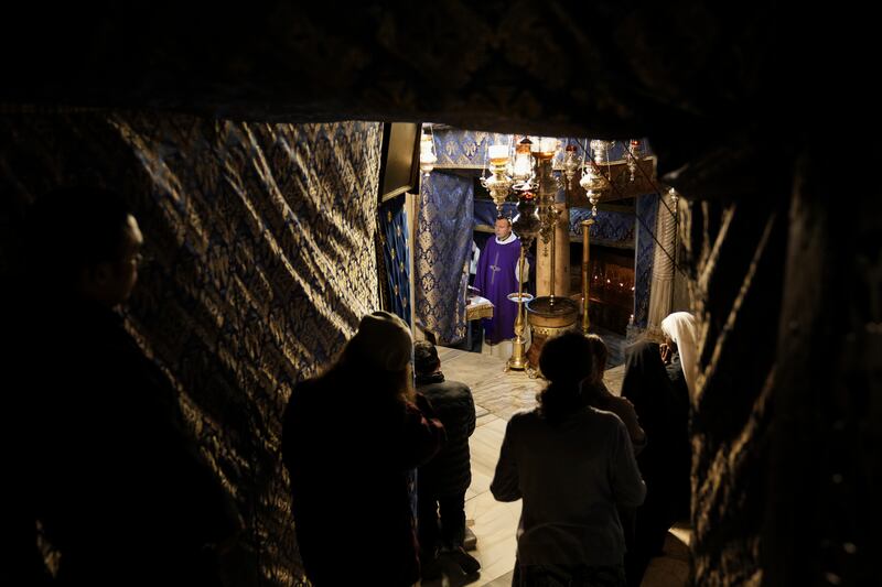 People visit the Grotto under the Church of the Nativity, traditionally believed to be the birthplace of Jesus, on Christmas Eve (AP)