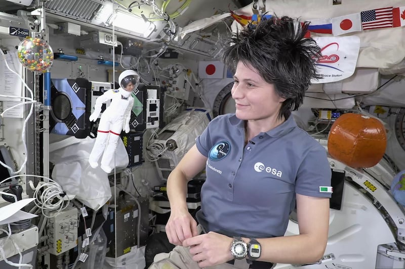 Europe’s first female commander of the ISS, ESA astronaut Samantha Cristoforetti with her lookalike Barbie doll on the ISS. Credit: ESA.