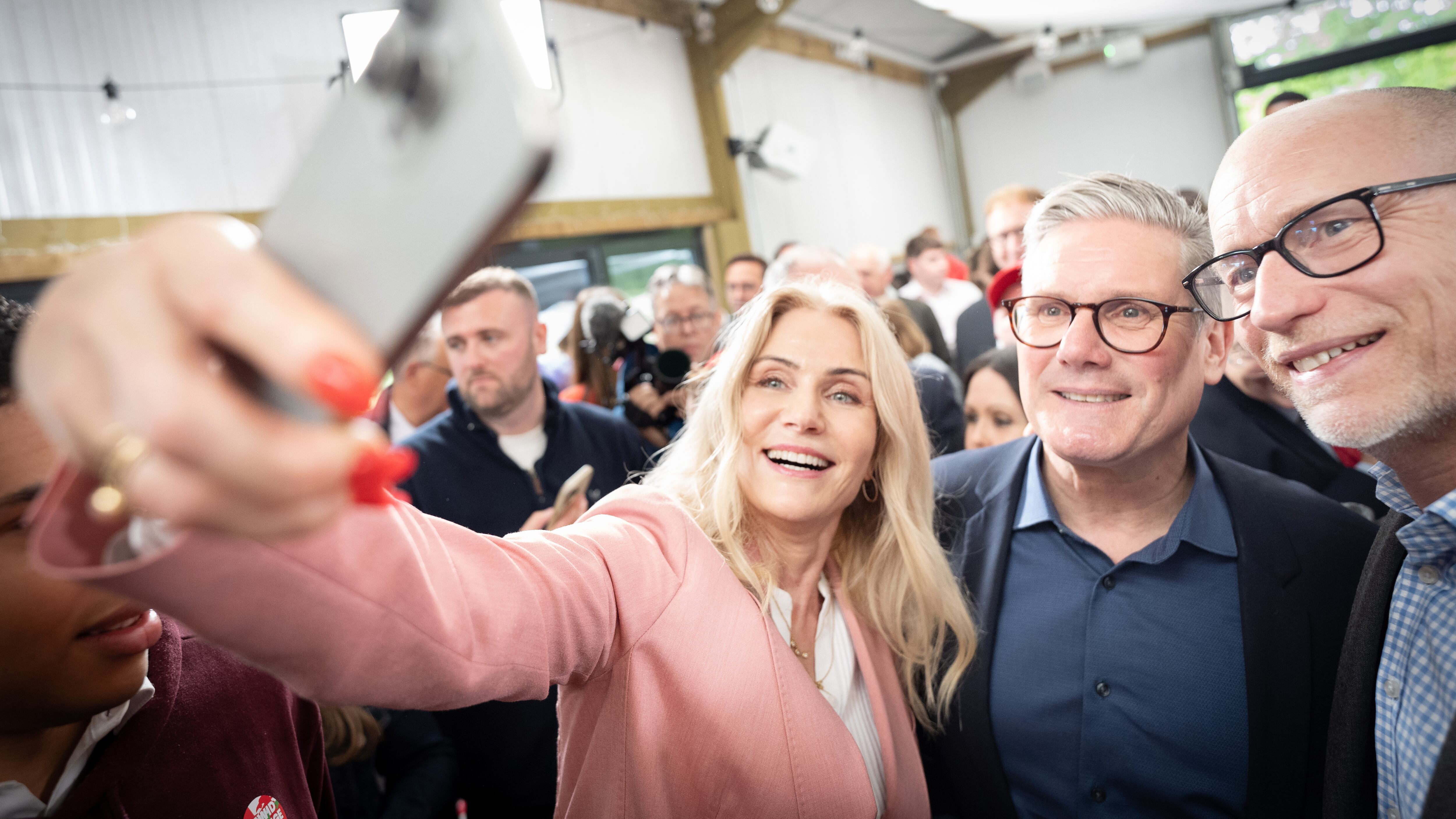 Former Danish Prime Minister Helle Thorning-Schmidt takes a selfie with Labour leader Sir Keir Starmer, who is tipped to win the General Election, on the campaign trail in Wales
