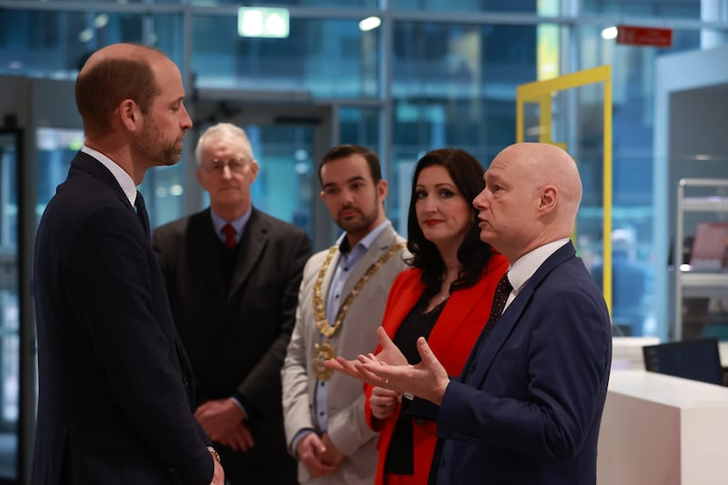 The Prince of Wales speaks to Northern Ireland Secretary Hilary Benn, Lord Mayor of Belfast, Micky Murray, Deputy First Minister Emma Little-Pengelly and university vice-chancellor Professor Paul Bartholomew