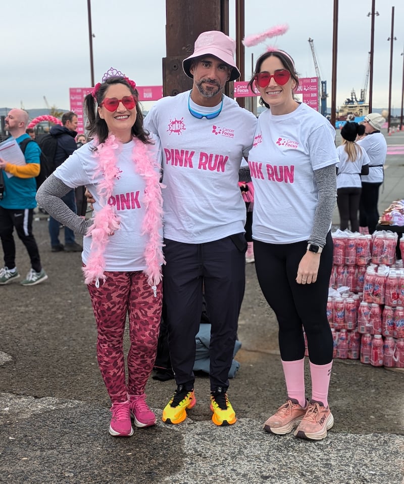 Breast cancer survivor Sarah McGuckin (left) from Downpatrick, pictured with fiancé Philipi and sister Niamh. PICTURE: ALLAN PRESTON