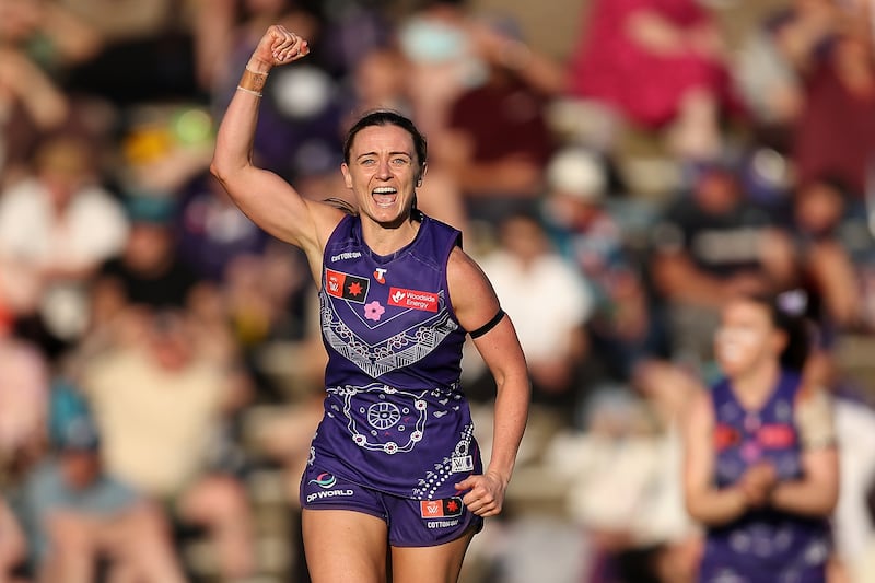 PERTH, AUSTRALIA - NOVEMBER 03: Amy Mulholland of the Dockers celebrates a goal during the round 10 AFLW match between Fremantle Dockers and Western Bulldogs at Fremantle Oval, on November 03, 2024, in Perth, Australia. (Photo by Paul Kane/Getty Images)