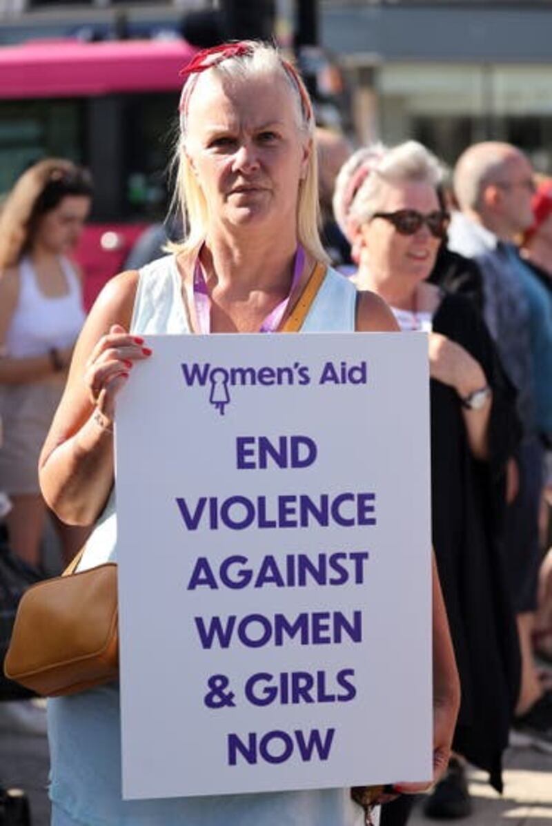 Sonya McMullan from Women’s Aid attends the vigil outside Belfast City Hall (Liam McBurney/PA)