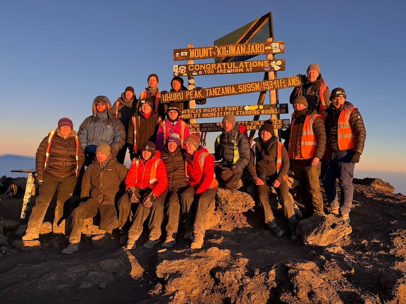 Trainee solicitor Conor Cleverley in his group of 16 Kilimanjaro climbers aged from 19 to 60