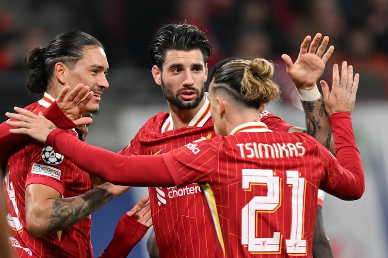 Darwin Nunez (left) celebrates with team-mates after scoring