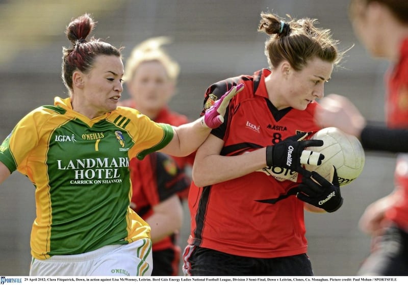 Clara Fitzpatrick wears the Down shirt in 2012 and battles with Leitrim&#39;s Lisa McWeeney. 