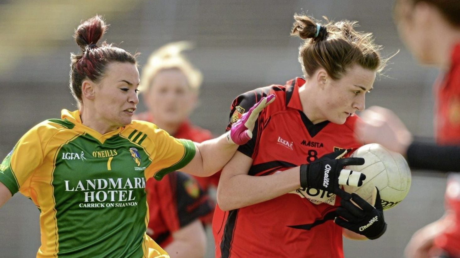 Clara Fitzpatrick wears the Down shirt in 2012 and battles with Leitrim&#39;s Lisa McWeeney. 
