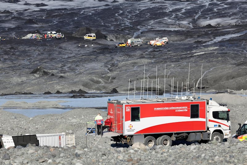 Three teams of rescuers are working to scoop and break down the ice while others continue to figure out who is trapped beneath the ice (STOD2/ Vilhelm Gunnarsson via AP)