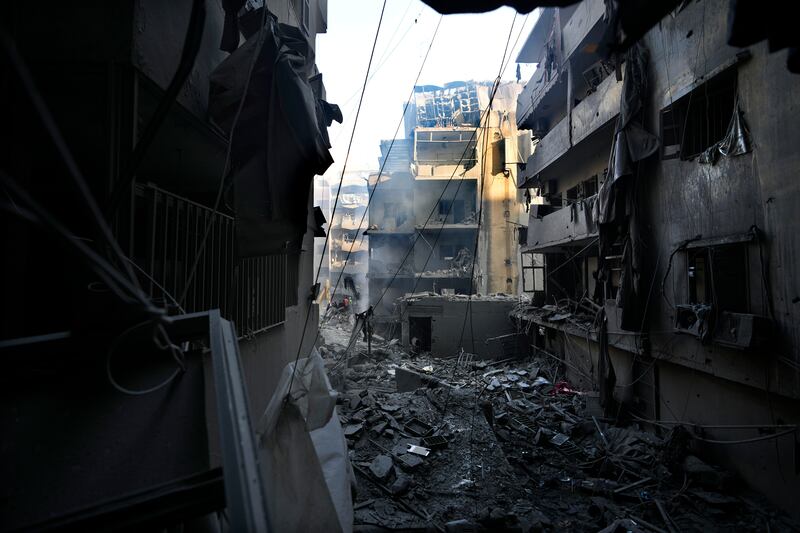 Destroyed buildings at the site of the Israeli air strike in Beirut (AP Photo/Hassan Ammar)