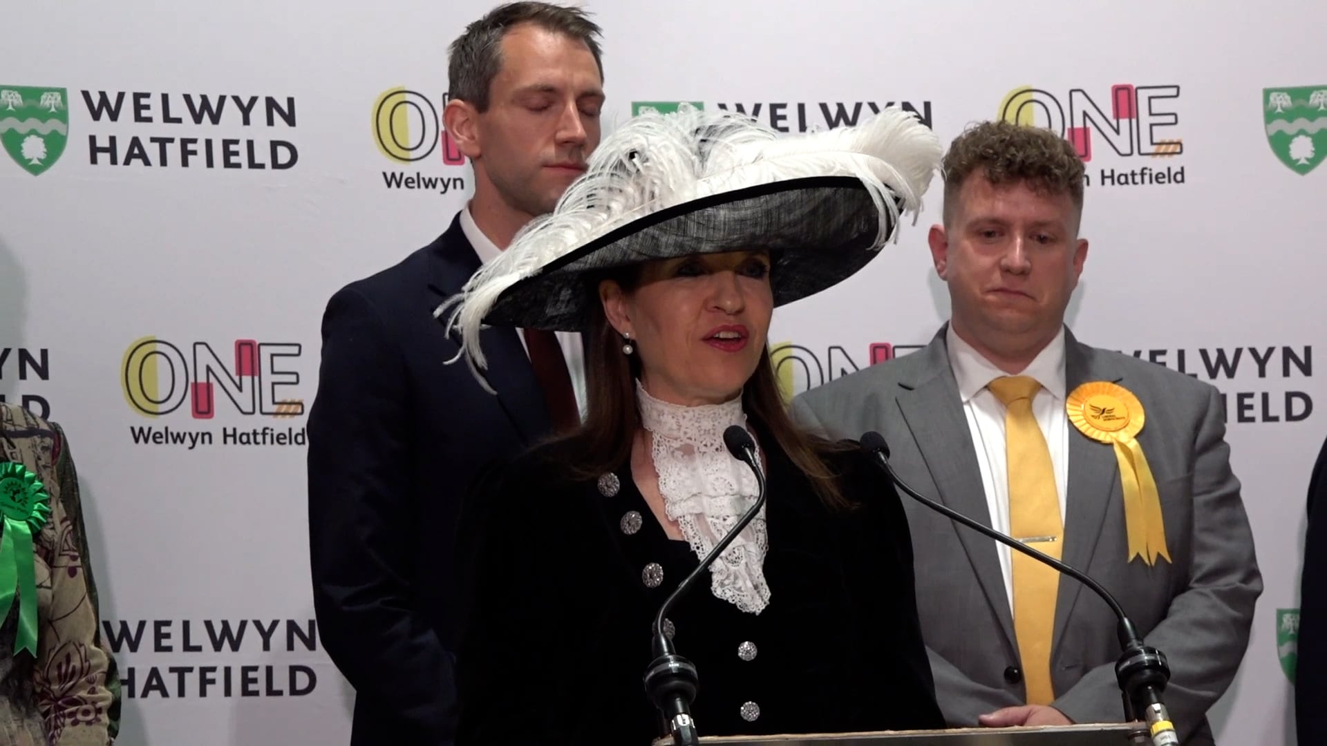Returning officer Annie Brewster donned a large brimmed hat to declare the result for Welwyn Hatfield