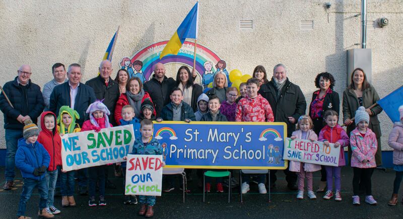 Parents and pupils of St Mary's P.S Fivemiletown celebrating after saving the school from closure.