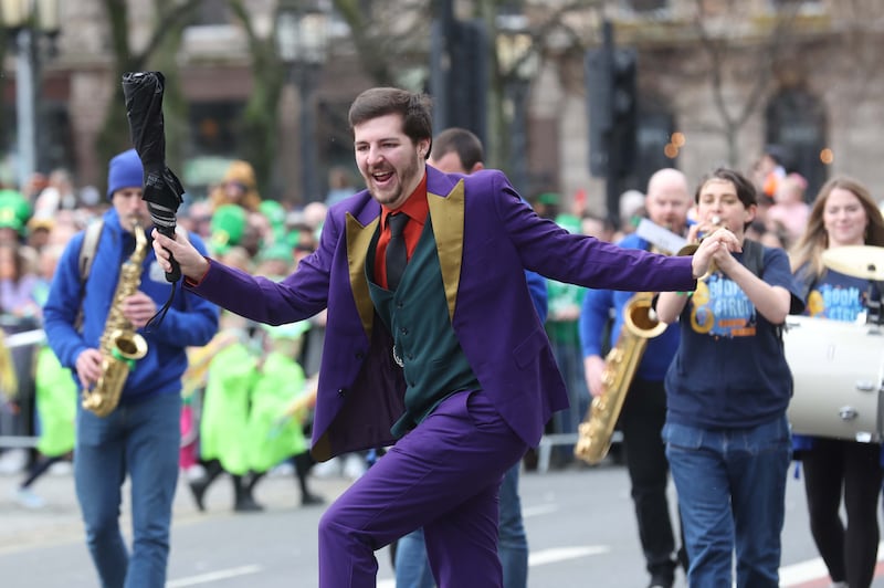 Performers entertain the crowd as  Thousands line the streets for the St Patrick’s day Parade in Belfast on Sunday.
PICTURE COLM LENAGHAN