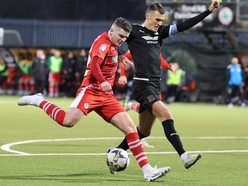 Image 37 of 52

Cliftonville v Ballymena Utd 082.JPGADD TO LIGHTBOXDOWNLOAD
Cliftonville Ronan Hale scores his second goal In today's game at the Solitude Cliftonville v Ballymena in the Sports Direct Premiership 12/1/2024 Pacemaker Press