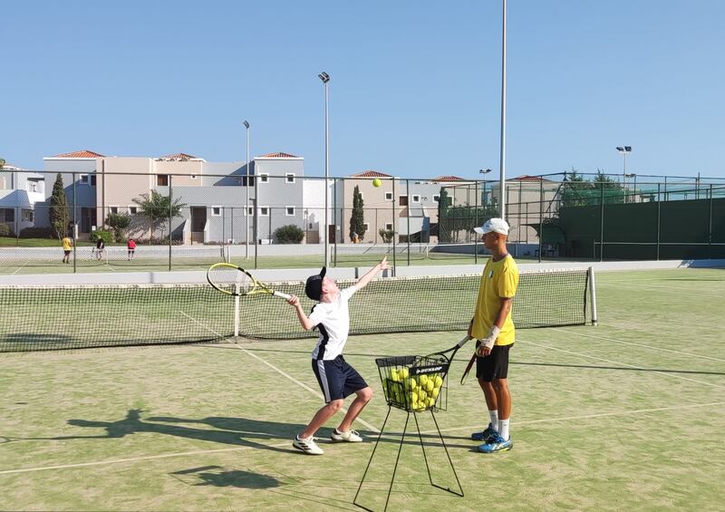 Tennis lessons on one of the resort's four courts