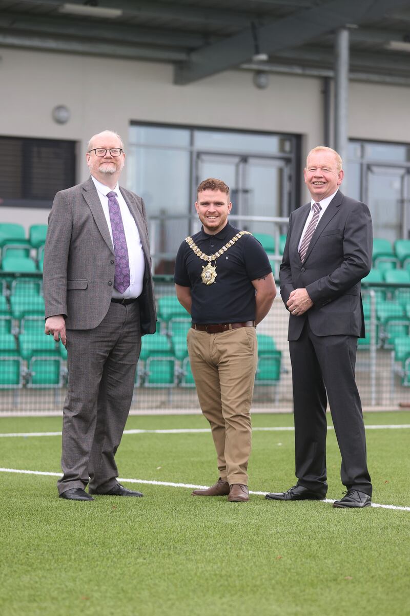 Gareth Johnston from the Executive Office, Belfast Lord Mayor Councillor Ryan Murphy and Patrick Anderson from the Department for Communities at Marrowbone Millennium Park. 