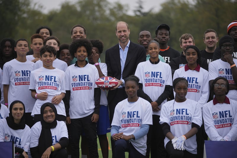 The Prince of Wales poses with participants