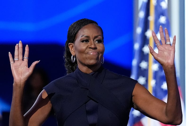 Former first lady Michelle Obama addresses the convention (Brynn Anderson/AP)