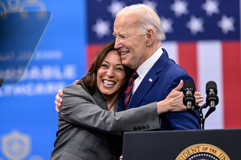 Kamala Harris embraces President Joe Biden after a speech on healthcare (Matt Kelley/AP)