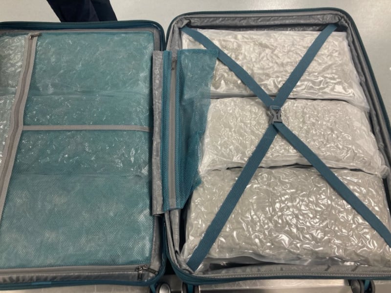 A suitcase full of cannabis seized from Lyndsey Russell, 38, from Grimsby, who was arrested at Manchester Airport after flying in from Thailand, and jailed for 21 months in June this year.