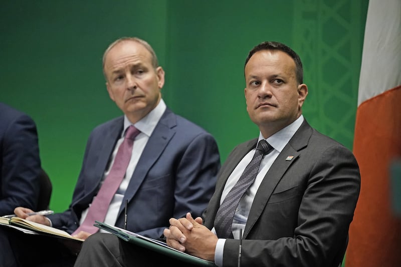 Fianna Fail leader Micheal Martin (left) and former Fine Gael leader Leo Varadkar agreed to enter power together in 2020