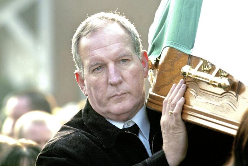 Alan Lewis - PhotopressBelfast.co.uk    21/6/2020.Mandatory Credit - Picture by Justin Kernoghan.TODAY - Republican Bobby Storey has died..FLASHBACK - Bobby Storey helping to carry the coffin of former senior provisional IRA member Brendan &#39;The Dark&#39; Hughes in Belfast on 19/2/2008... 