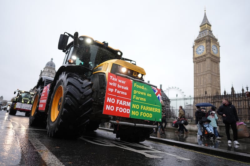 Despite being asked not to bring machinery, farmers drive tractors in Westminster ahead of the rally