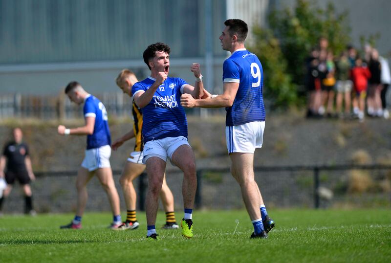 Two Clan na Gael players celebrating a goal