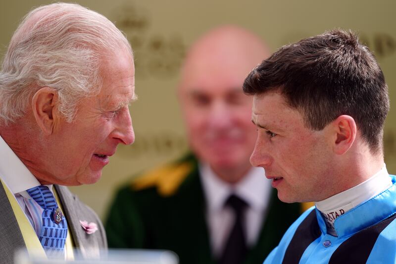 The King with Oisin Murphy after the jockey won the King Charles III Stakes on Asfoora