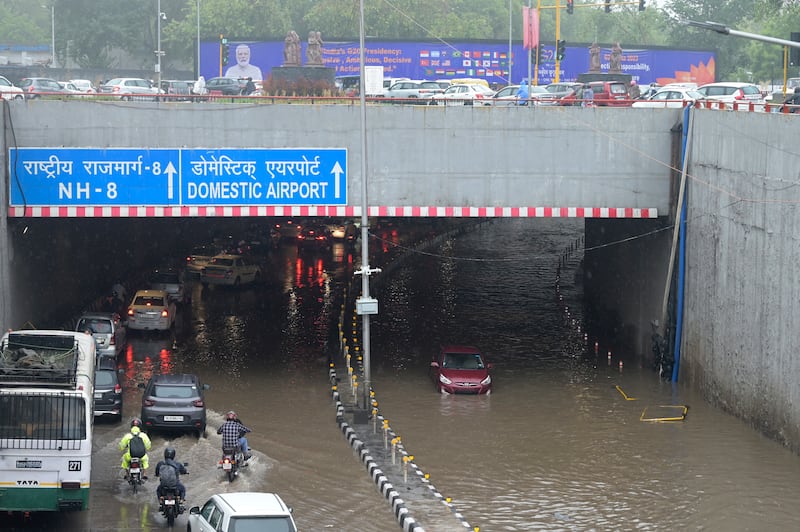 Traffic in New Delhi was hampered by the flooding (AP)