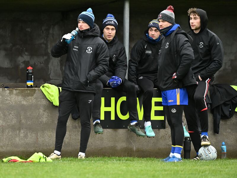 Sunday 15th December 2024
Peter Og McCartan Ben McDonnell and Darragh Canavan  Niall Kelly and Odhran Robinson of Errigal Ciaran taking it easy on the bench against  Carrickmore in the Tyrone ttop 4 league semi final at Errigal Ciaran, Co Tyrone. Picture Oliver McVeigh