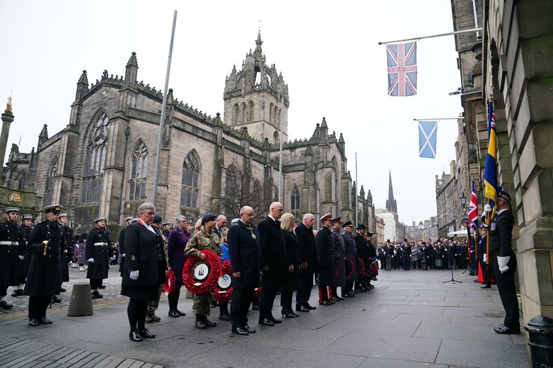 The wreath-laying ceremony followed a military parade down the Royal Mile