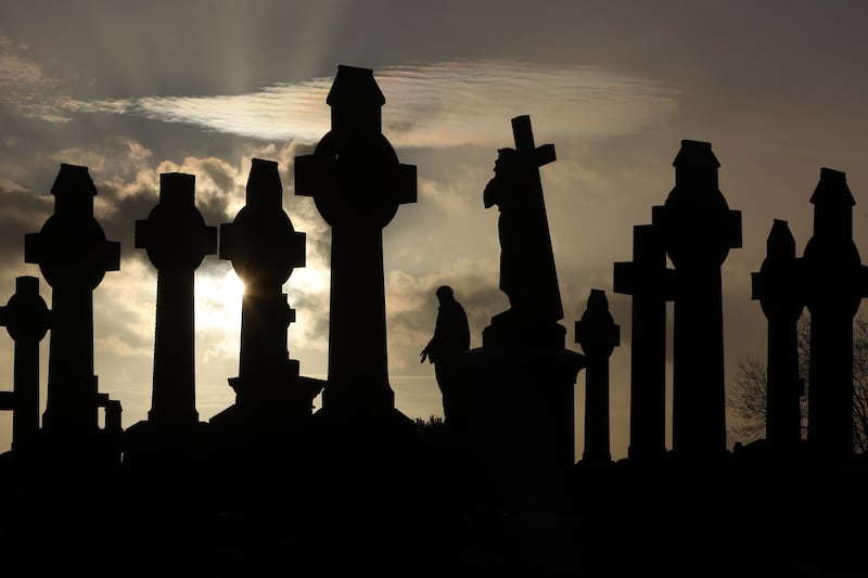 Sunrise in Milltown Cemetery in west Belfast on the morning of the Winter Solstice. PICTURE: MAL MCCANN