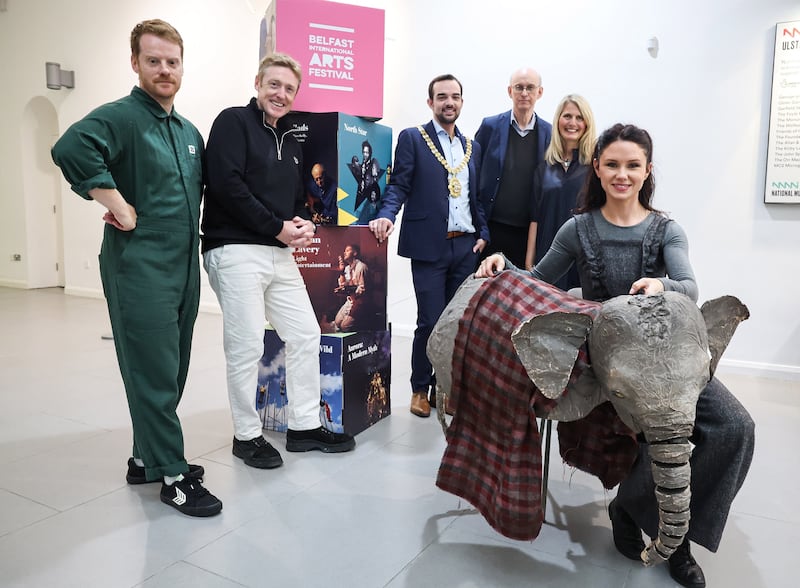 Pictured at the launch of the 2024 Belfast International Arts Festival programme are (from left) musician Ciaran Lavery, Cahoots artistic director Paul Bosco McEneaney, Belfast Lord Mayor councillor Micky Murray, festival chief executive and artistic director Richard Wakely, festival chair Fiona Kane, and Philippa O’Hara with baby elephant Janu from the upcoming production of The Vanishing Elephant at The Grand Opera House.