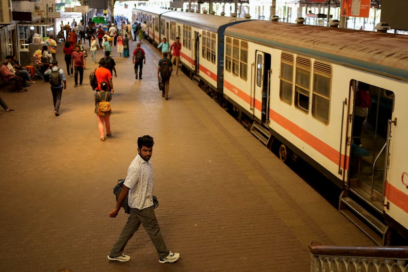 Passengers had to brave dangerously overcrowded trains or were stranded at stations (Eranga Jayawardena/AP)