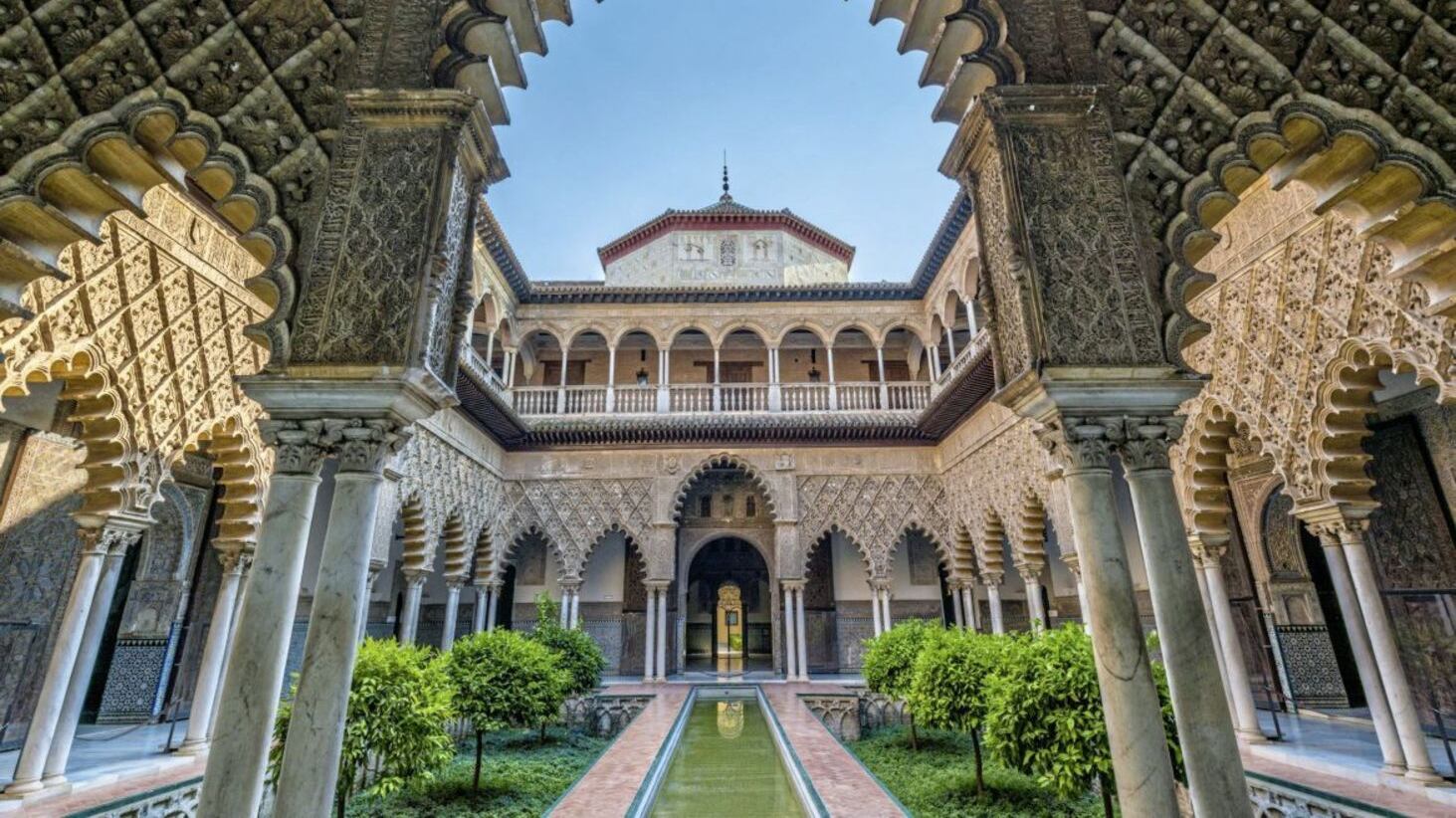 The Real Alcazar (Royal Palace) in Seville, a World Heritage Site where quotations from the Koran mix with Christian symbols 
