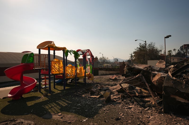 The disaster has destroyed entire homes with flames hitting churches, schools, a synagogue, libraries, bars and playgrounds (Jae C Hong/AP)