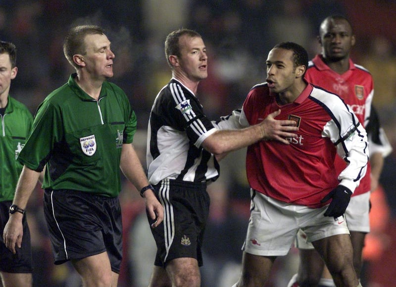 Arsenal striker Thierry Henry had to be restrained at the end of a stormy game at Highbury in December 2001