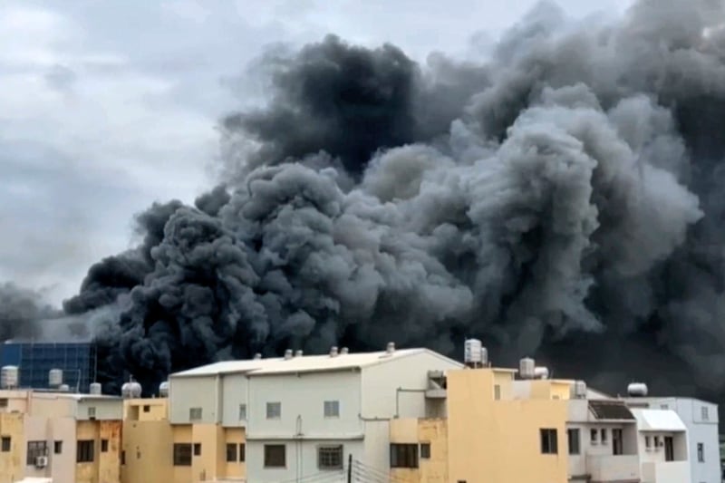 Smoke rises from a building in central Taiwan (EBC via AP)