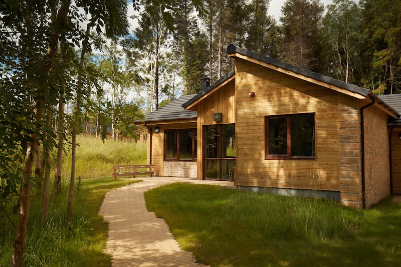 Other sites feature woodland lodges