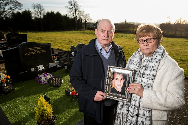 Stephen and Breege Quinn at the graveside of their murdered son Paul Quinn at St Patrick’s Church Cullyhanna Co Armagh .