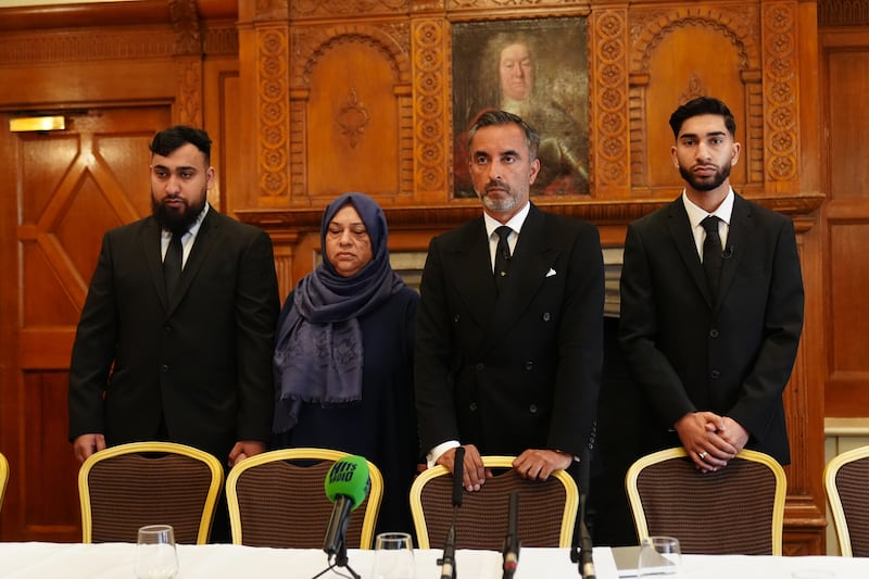 Solictor Aamer Anwar (second right) with brothers Muhammad Amaad (left) and Fahir Amaaz (right) and their mother Shameem Akhtar