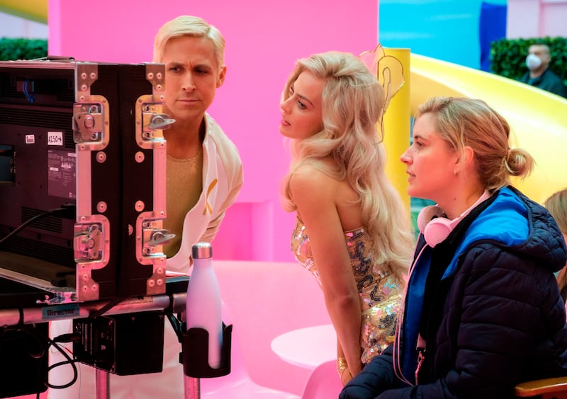 Ryan Gosling and Margot Robbie with director Greta Gerwig on the set of Barbie (Jaap Buitendijk/Warner Bros Pictures/AP)